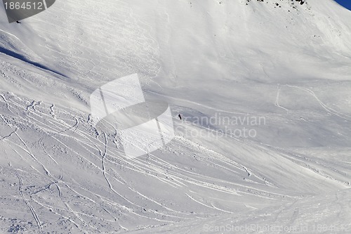 Image of Snowboarder on ski piste