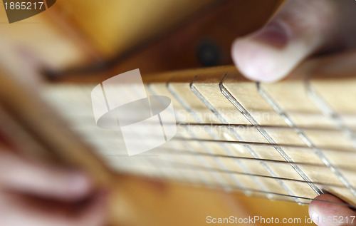 Image of Playing the guitar