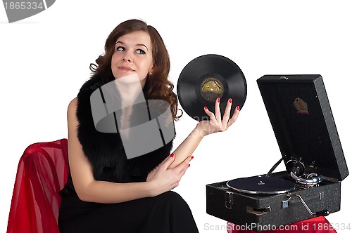 Image of Pretty woman with gramophone