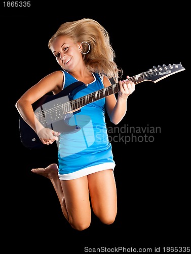 Image of Attractive girl with guitar