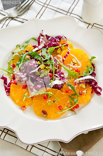 Image of Orange with radicchio and Pomegranate salad