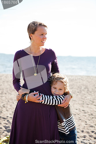 Image of Mother and son at beach.