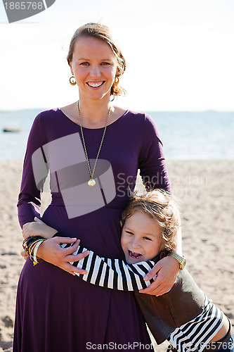 Image of Mother and son at beach.