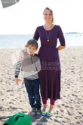 Image of Mother and son at beach.