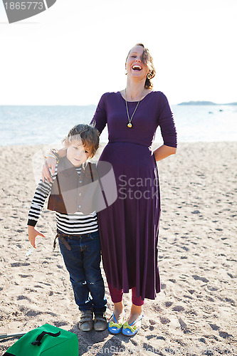 Image of Mother and son at beach.