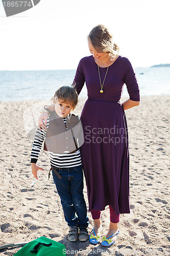 Image of Mother and son at beach.