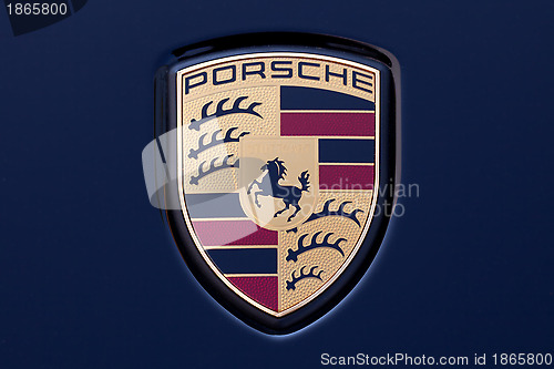 Image of Porsche logo on dark blue