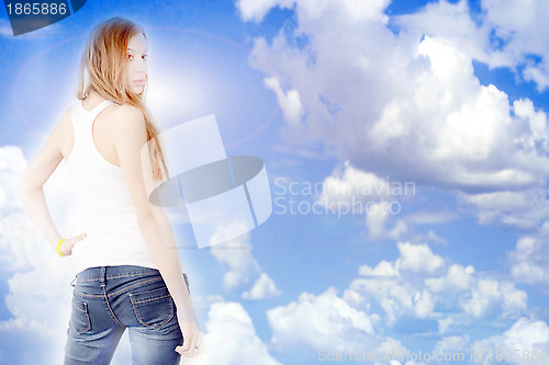 Image of redheaded girl and solar sky