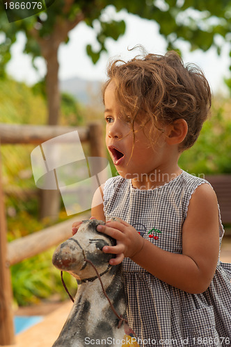 Image of Ejoying with an old toy