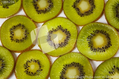 Image of pattern made of kiwi slices