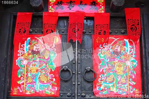 Image of Doorknob and red paper decorations