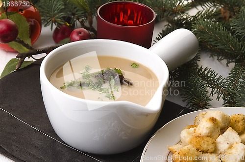 Image of Traditional polish mushroom soup with cream and vegetables