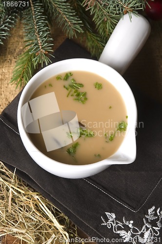 Image of Traditional polish mushroom soup with cream and vegetables