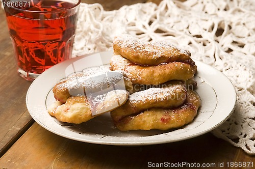 Image of Dough with marmelade on wooden board