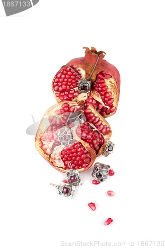 Image of Jewelry and pomegranate