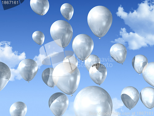 Image of white balloons on a blue sky