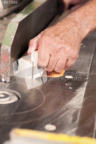 Image of Carpenter hands at work