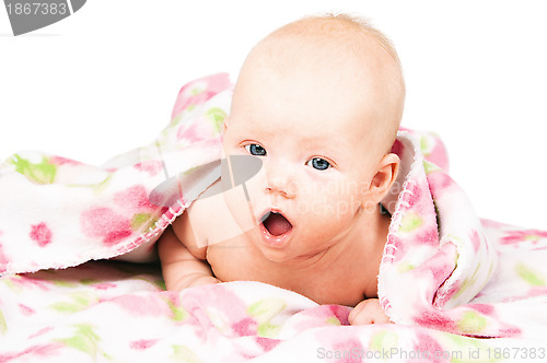 Image of Little baby under multicolored towel
