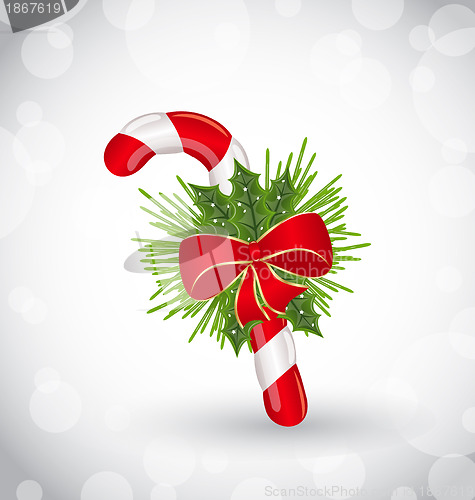 Image of Christmas decoration with sweet cane, bow and pine