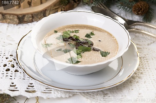 Image of Traditional polish mushroom soup with cream and vegetables