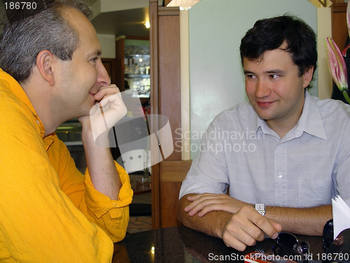 Image of Two man at the restaurant
