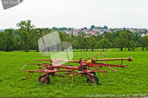 Image of old hay turning machine