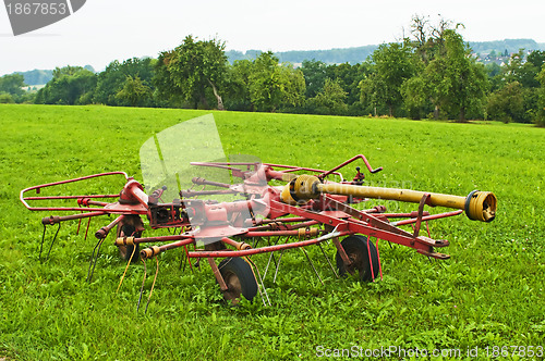 Image of old hay turning machine