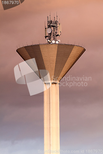 Image of Modern water tank tower with communications antennas