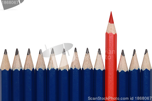 Image of Red crayon standing out from the crowd