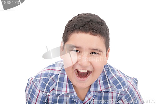 Image of A boy screaming loud with mouth wide open 