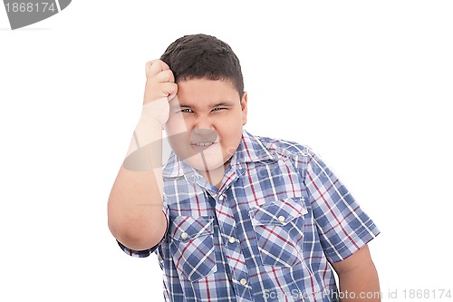 Image of Adorable boy upset isolated over white background 