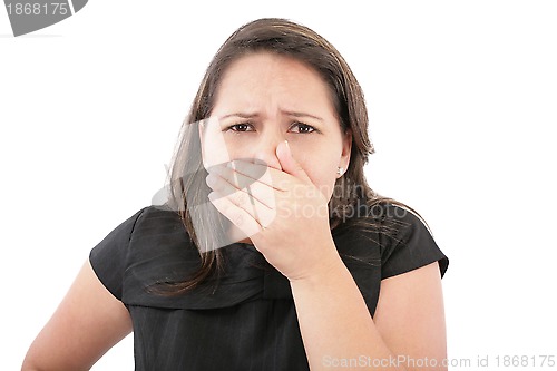 Image of Covering her nose after a bad smell 