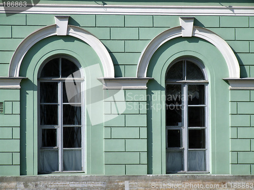 Image of Windows on a green wall