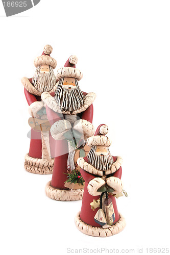 Image of Three Santa figures isolated