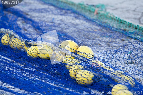 Image of fishnet trawl rope putdoor in summer at harbour