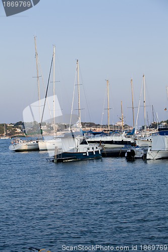 Image of fishing boat in summer outside in sea at harbour