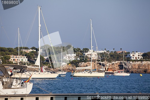 Image of fishing boat in summer outside in sea at harbour