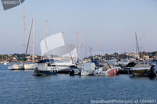 Image of fishing boat in summer outside in sea at harbour