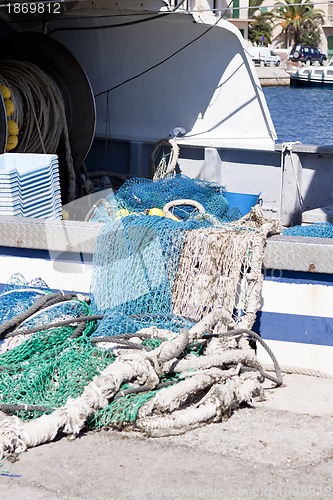 Image of fishnet trawl rope putdoor in summer at harbour