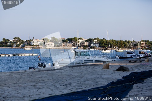 Image of fishing boat in summer outside in sea at harbour