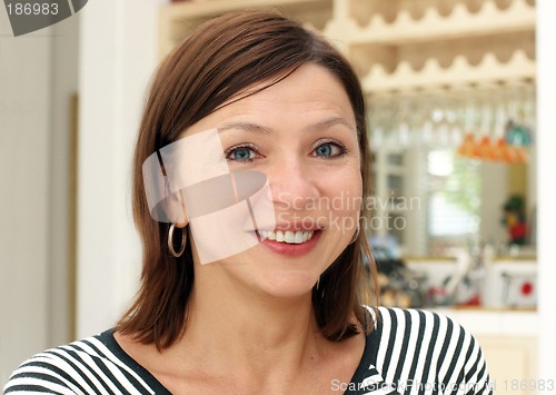 Image of Mature woman at home