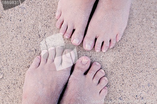 Image of barefoot in the sand in summer holidays relaxing
