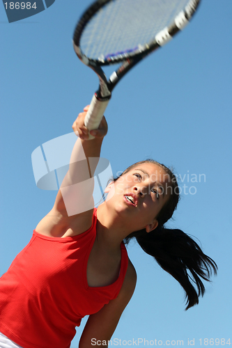 Image of Girl playing tennis