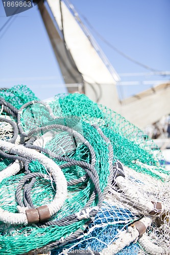 Image of fishnet trawl rope putdoor in summer at harbour