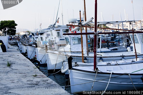 Image of fishing boat in summer outside in sea at harbour