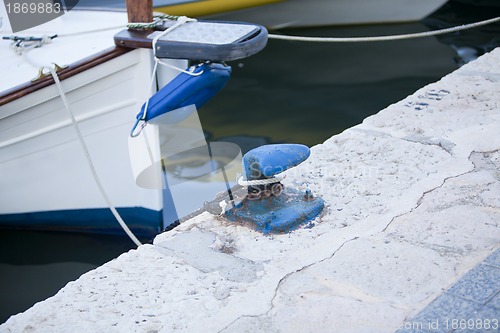 Image of fishing boat in summer outside in sea at harbour