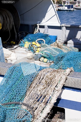 Image of fishnet trawl rope putdoor in summer at harbour