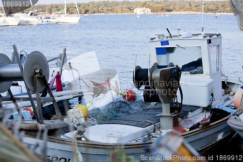 Image of fishing boat in summer outside in sea at harbour