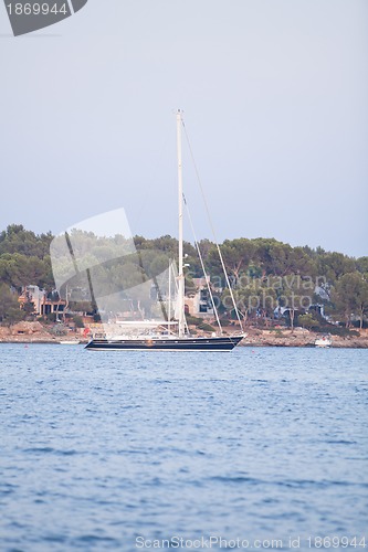 Image of fishing boat in summer outside in sea at harbour