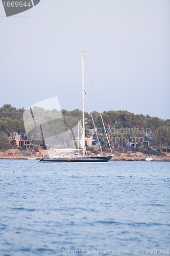 Image of fishing boat in summer outside in sea at harbour